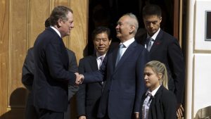 Chinese Vice Premier Liu He shakes hands with U.S. Trade Representative Robert Lighthizer