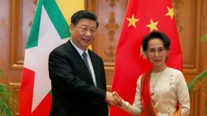 Myanmar State Counselor Aung San Suu Kyi shakes hands with Chinese President Xi Jinping at the Presidential Palace in Naypyitaw, Myanmar, January 18, 2020. Nyein Chan Naing/Pool via REUTERS (Myanmar)