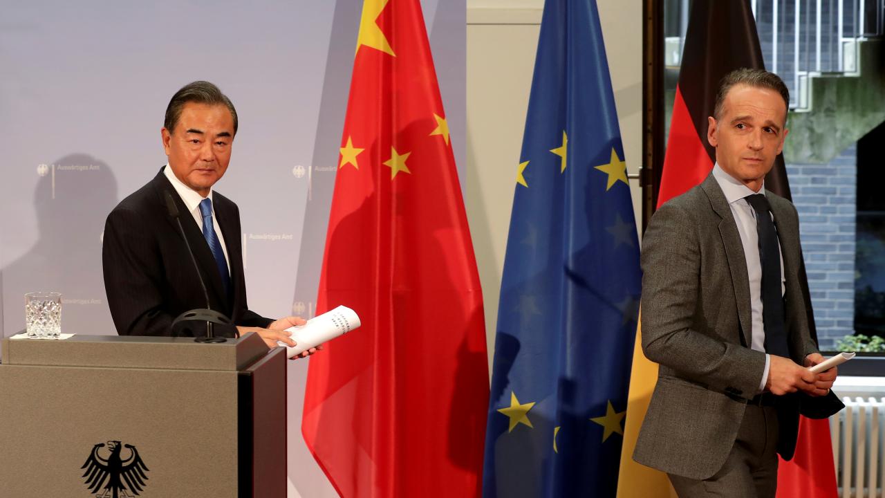 German Foreign Minister Heiko Maas and China's Foreign Minister Wang Yi leave after a joint news conference as part of a meeting in Berlin, Germany September 1, 2020. Michael Sohn/Pool via REUTERS (Germany)