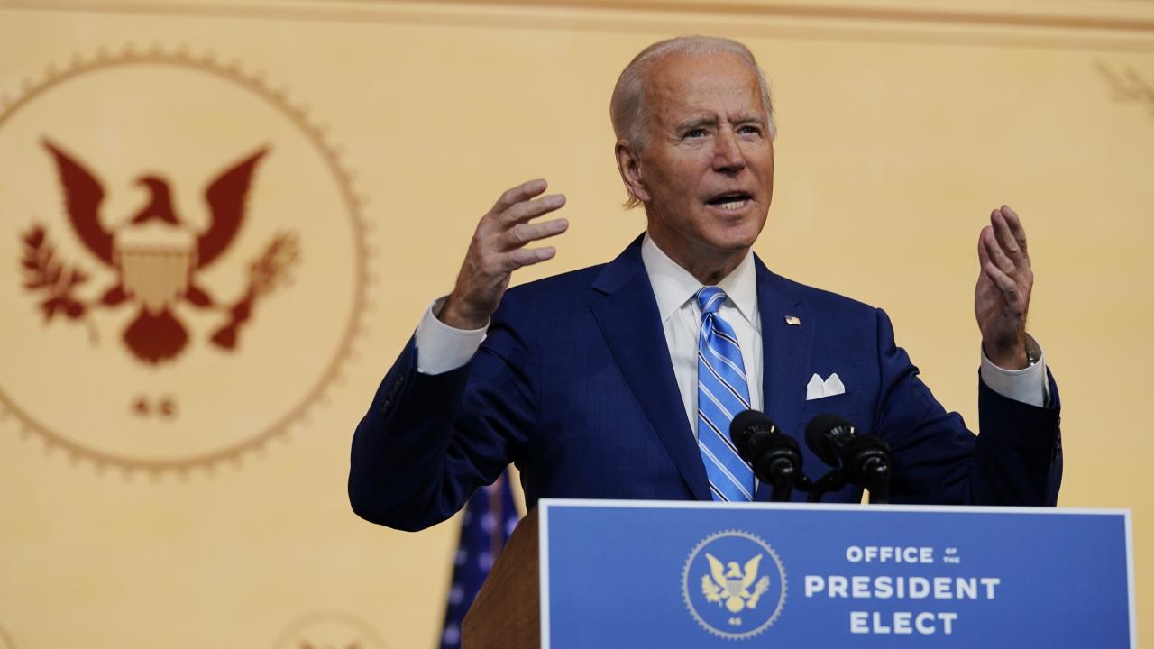 President-elect Joe Biden speaks at The Queen theater, Wednesday, Nov. 25, 2020, in Wilmington, Del. (AP Photo/Carolyn Kaster)