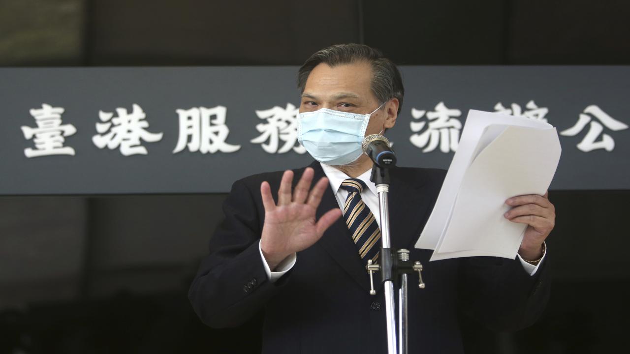 Taiwan's Mainland Affairs Council Minister Chen Ming-tong gestures while speaking during an opening ceremony of the Taiwan Hong Kong Service Exchange Office, in Taipei, Taiwan, Wednesday, July 1, 2020. Taiwan officially opened the specialized office on Wednesday to support Hong Kong people seeking to move to Taiwan after China’s passage of a national security law for Hong Kong. (AP Photo/Chiang Ying-ying)