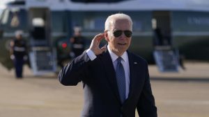 President Joe Biden gestures to reporters before boarding Air Force One at Heathrow Airport in London, Sunday, June 13, 2021. Biden is en route to Brussels to attend the NATO summit. (AP Photo/Patrick Semansky)