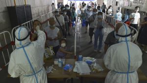 新型コロナ感染症 中国、感染拡大を警戒（写真：AP/アフロ）