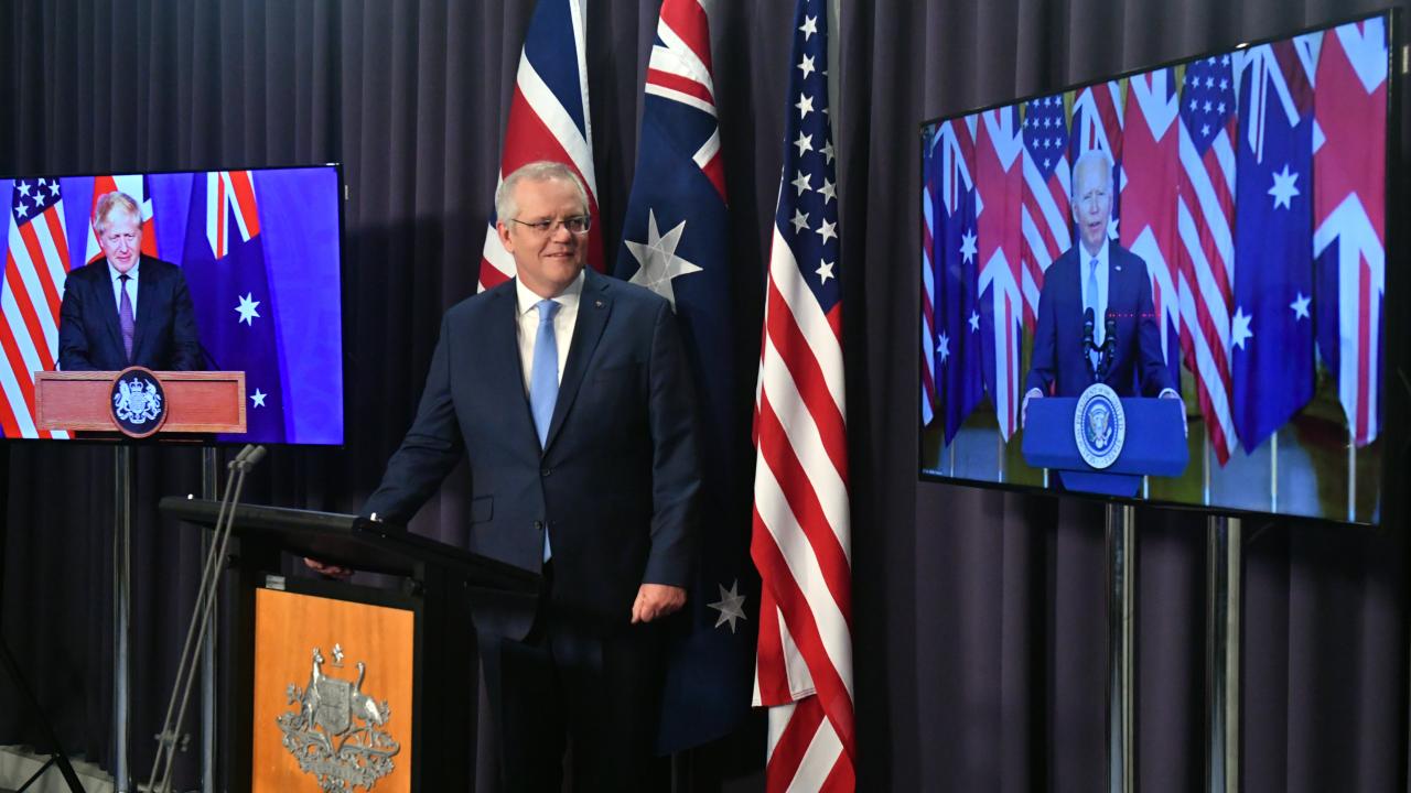 Britain’s Prime Minister Boris Johnson, Australia’s Prime Minister Scott Morrison and US President Joe Biden at a joint press conference via AVL from The Blue Room at Parliament House in Canberra, Thursday, September 16, 2021. (AAP Image/Mick Tsikas)